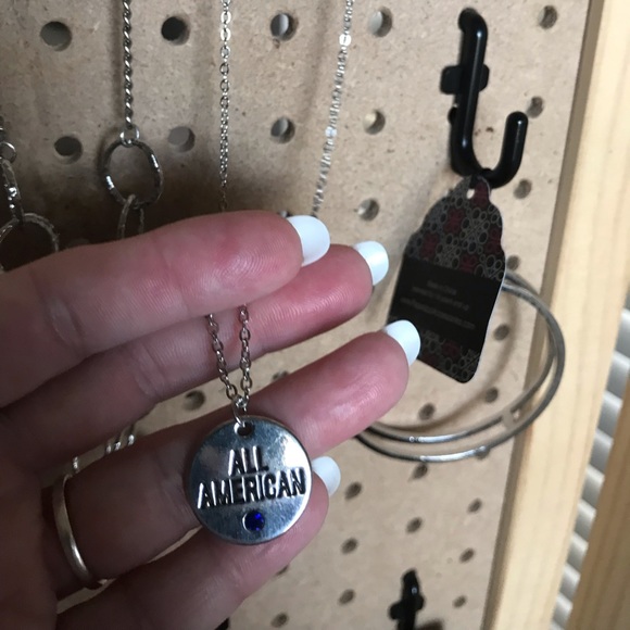 Short silver necklace w/“All American” &blue stone